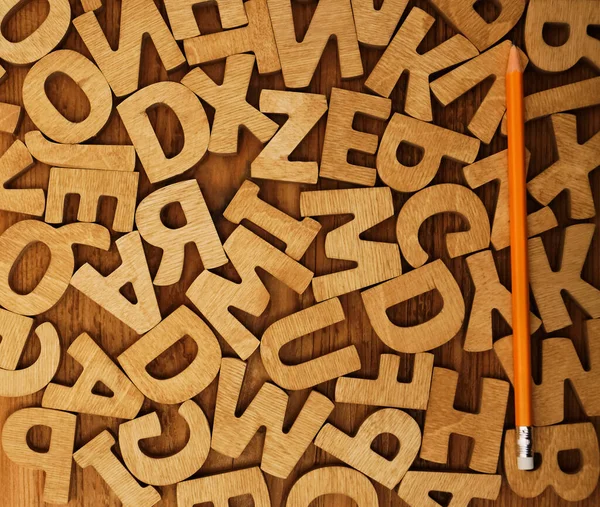 Fundo Diferentes Letras Madeira Lápis Amarelo Encontra Acima Fundo Das — Fotografia de Stock