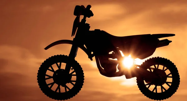 Silhouette Cross Enduro Motorcycle Jumping Sky Sunset Light Background — Stock Photo, Image