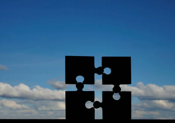 Vier Puzzleteile Auf Himmelshintergrund — Stockfoto