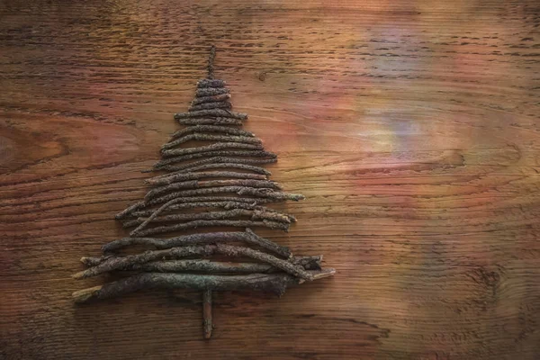 Árbol Navidad Palos Sobre Fondo Marrón Madera Feliz Año Nuevo —  Fotos de Stock