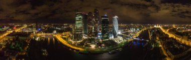 MOSCOW, RUSSIA - AUGUST 2019. Large panorama of the business center Moscow City at night clipart