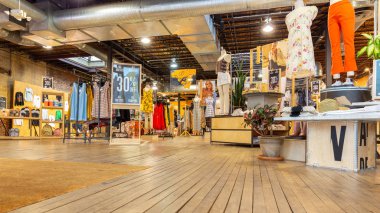 WASHINGTON DC - MAY 6, 2018: Indoor view of an Urban Outfitters shop. Urban Outfitters is an American multinational lifestyle retail corporation headquartered in Philadelphia, Pennsylvania clipart