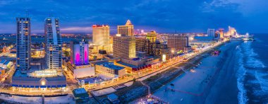 Aerial panorama of Atlantic City at dusk clipart