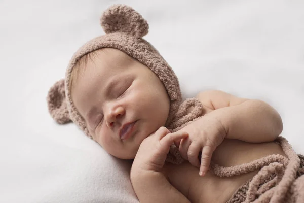 Portrait of a newborn boy in a hat with ears — Stock Photo, Image