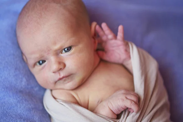 Portrait of a newborn baby with open eyes — Stock Photo, Image