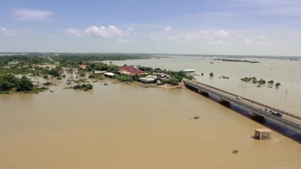 Aerial Drone Shot Flying Concrete Bridge Running Flooded River Rural — Vídeos de Stock