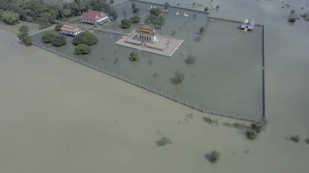 Aerial View Fly Revealing Pagoda Surrounded Floodwaters — Stock Video