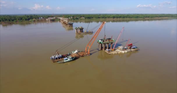 Aerial Panning Shot Bridges Foundations Barges Mounted Cranes River — Stock Video