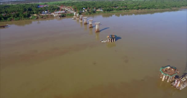 Aerial Drone Shot Fly Construction Bridge Starting Riverbank — Stock Video