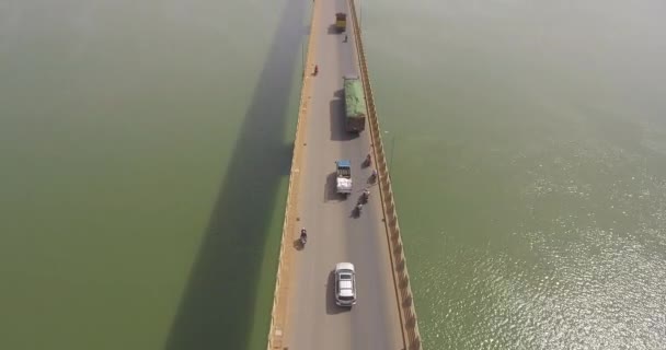 Aerial Tilting Revealing Vehicles Crossing Road Bridge River — Stock Video