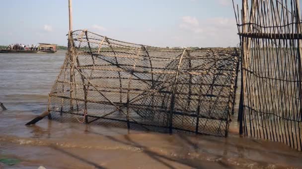 Close Large Bamboo Fish Traps Edge River Ferry Boat Crossing — Stock Video