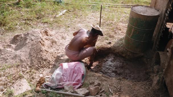 Man Filling Mud Bucket Restoring Dry Wall Tobacco Barn — Stock Video