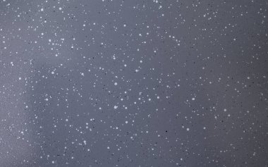 Tencere ya da tencerede siyah ve beyaz noktalı gri seramik kaplama, soyut yakın dokusu var.  