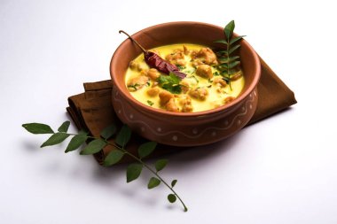 Kadhi Pakoda or pakora, Indian cuisine, selective focus clipart