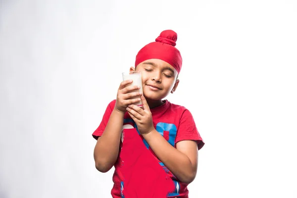 Indian Sikh Punjabi Small Boy Holding Glass Full Milk Isolated — Stock Photo, Image