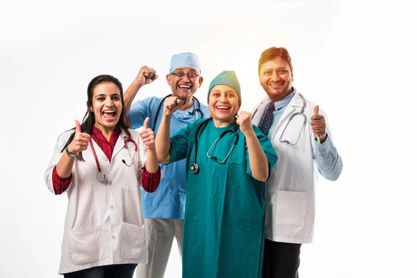 Indian Doctors Group Photo Showing Success Thumbs Sign Standing Isolated — Stock Photo, Image