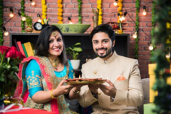 Indian Couple Diya Sweets Gifts While Celebrating Diwali Deepavali Dipavali — Stock Photo, Image