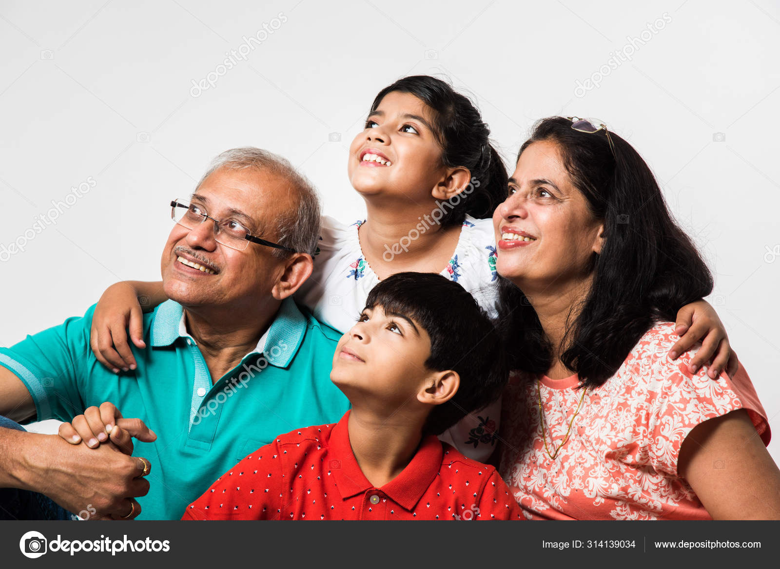 Indian Kids Grandparents Smiling While Sitting White Background