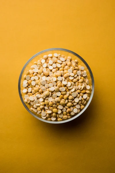 Kızarmış Split Nohut Daliya / Dalia veya Chana Dal, Hindistan 'da popüler sağlıklı bir yol kenarı atıştırmalığıdır.