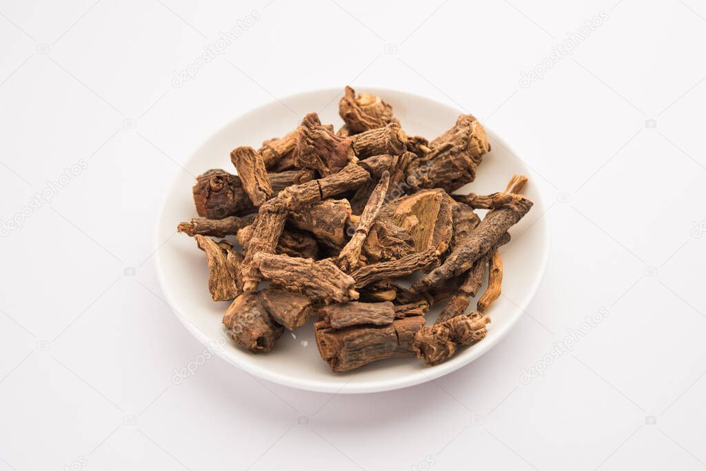 Raw dried Indian Ayurvedic Sarsaparilla is used for treating psoriasis & skin diseases, rheumatoid arthritis and kidney disease, selective focus