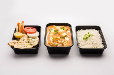 Paneer Butter Masala packed in plastic container or box, ready for home delivery or pickup clipart