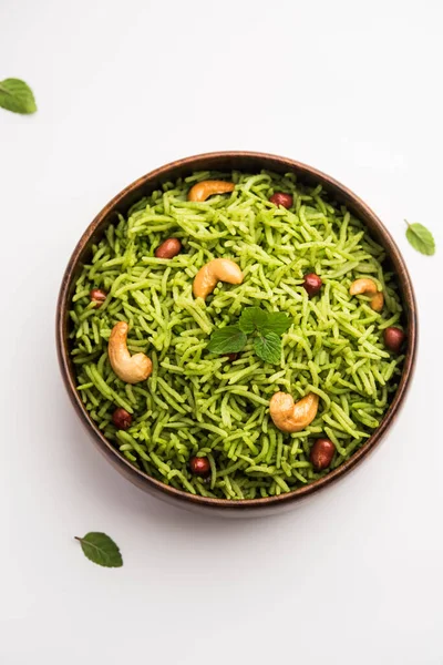 stock image Mint Rice - Basmati rice cooked with fresh pudina leaves and garnished with Peanuts and Cashew nuts or kaju