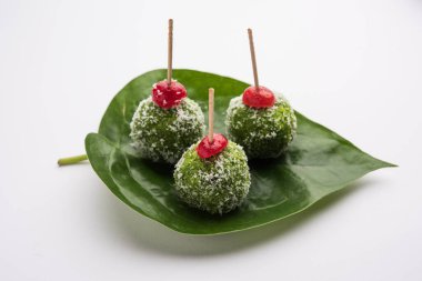 Paan Coconut Ladduor Ladoo - Betel Leaves mixed with Nariyal and sugar to make sweet Balls having Pan Flavour clipart