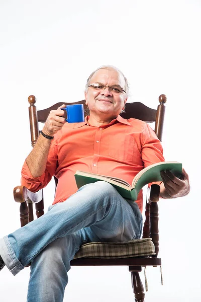 Portrait Happy Mature Indian Asian Man Reading Book While Sitting — Stock Photo, Image