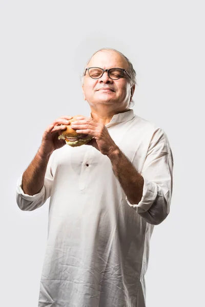 Indian Old Man Eating Burger Hamburger Mango Juice Cold Drink — Stock Photo, Image