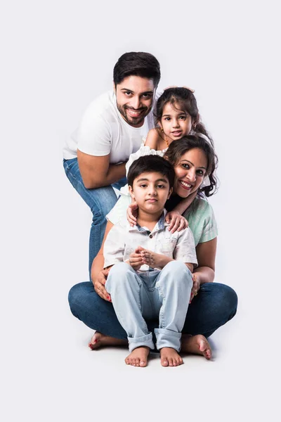 Portrait Indian Asian Young Family Four Sitting White Flour White — Stock Photo, Image