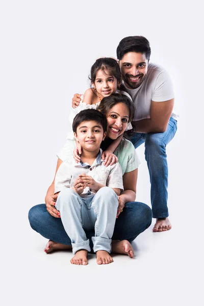 Portrait Indian Asian Young Family Four Sitting White Flour White — Stock Photo, Image