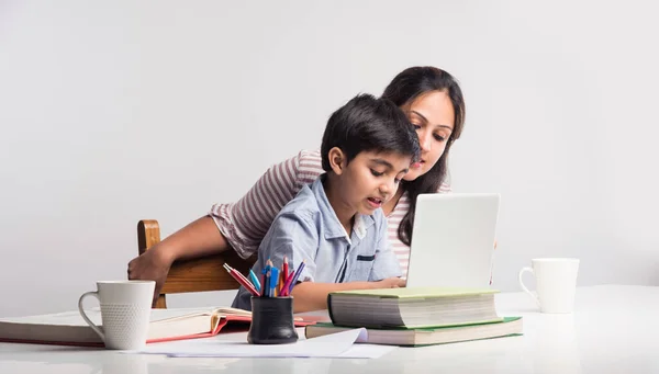 Cute Indian Boy Mother Doing Homework Home Using Laptop Books — Stock Photo, Image