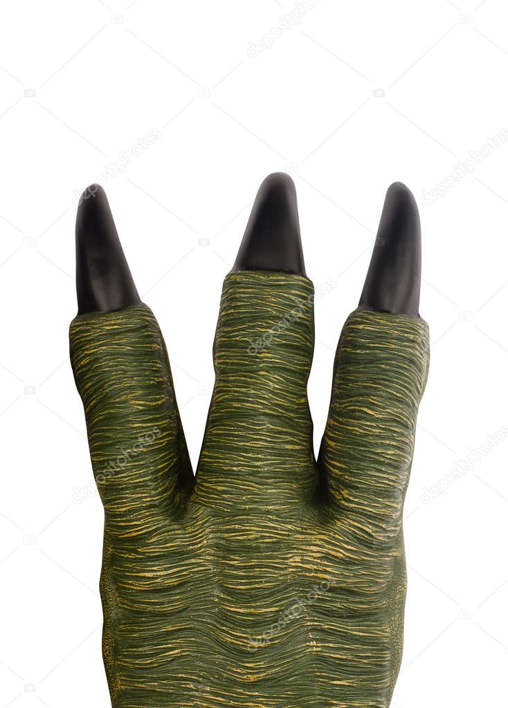 green toy monster paw with black claws