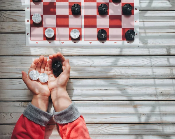 Child Plays Checkers White Black Checkers Children Hands Children School — Stock Photo, Image