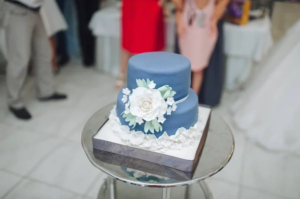Wedding cake with decor. Flowers on the cake.