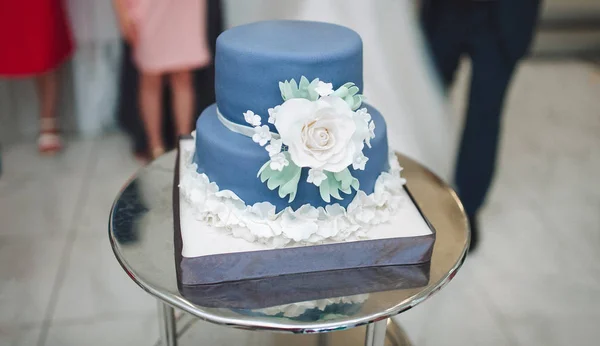 Holiday cake with decor. Flowers on the cake.