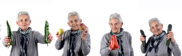 Seniorin Mit Obst Und Gemüse Auf Weiß — Stockfoto