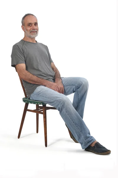 Portret Połowie Wieku Człowiek Siedzi Białym — Zdjęcie stockowe
