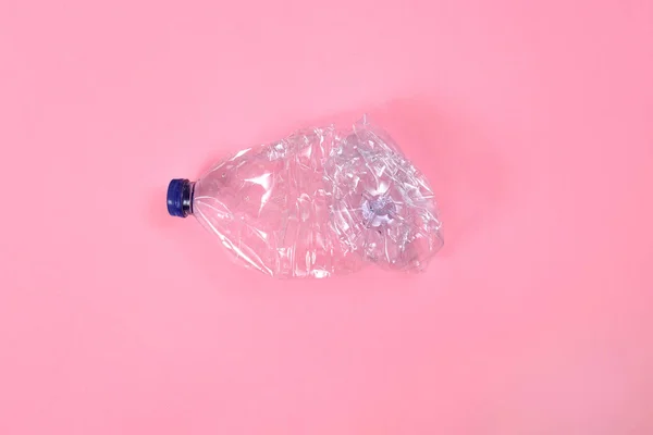 Deformed Plastic Bottle Pink Background — Stock Photo, Image