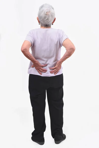 Retrato completo de la espalda de una mujer mayor con dolor en el bac —  Fotos de Stock