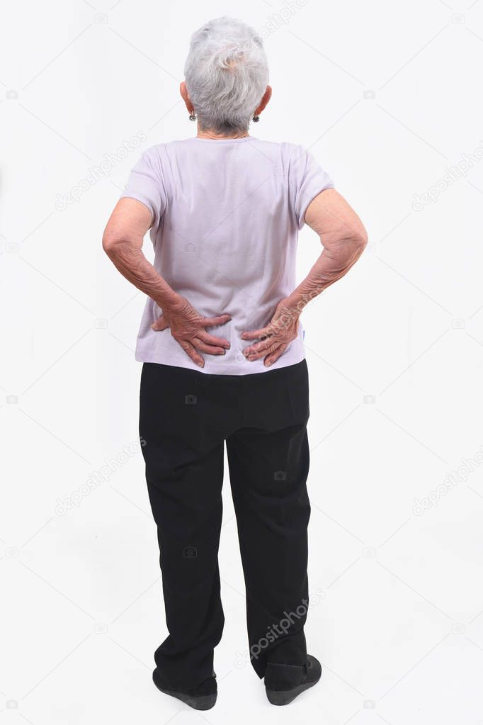 full portrait of the back of an older woman with pain in the bac