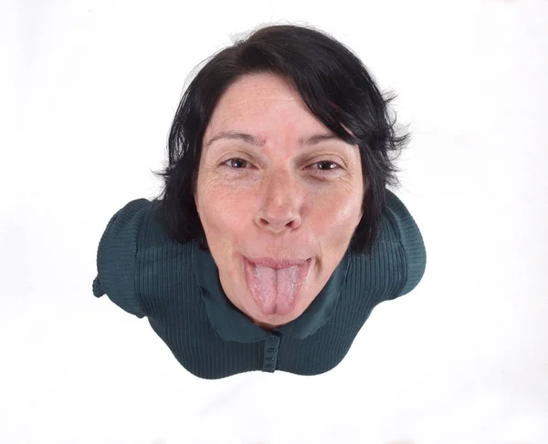 Kvinnan sticker ut tungan — Stockfoto