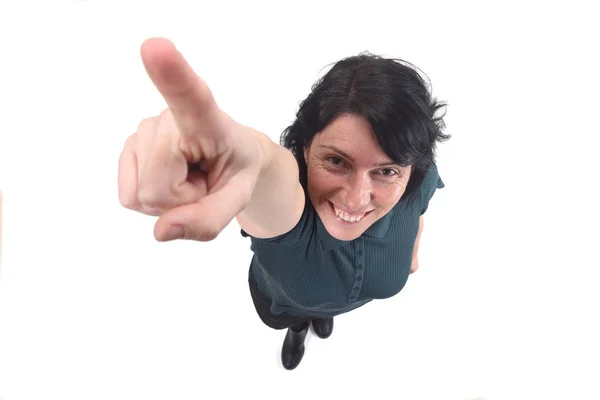 Woman pointing on white background — Stock Photo, Image