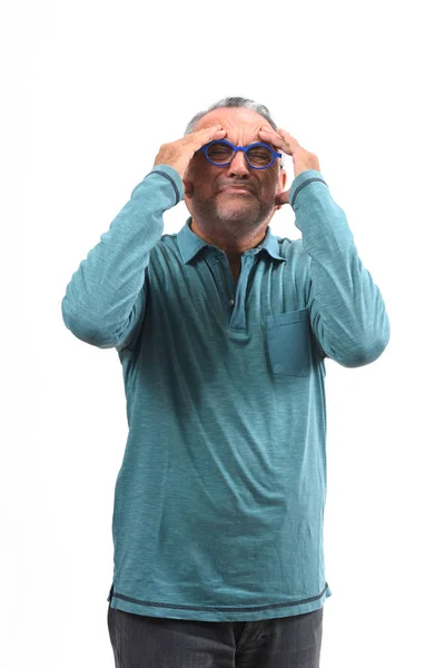 Man with headache on white background — Stock Photo, Image