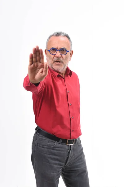 Man met stopteken witte achtergrond — Stockfoto