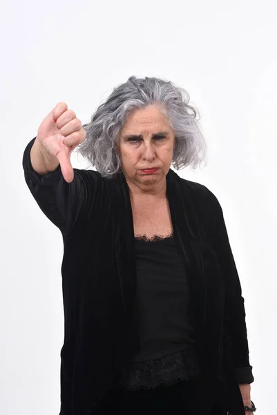 Woman thumps up on white background — Stock Photo, Image