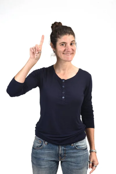 Mujer con el dedo en forma de número uno — Foto de Stock