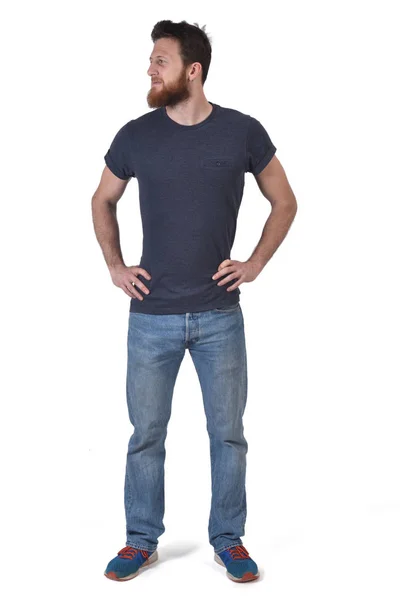 Retrato completo de un hombre manos en la cintura y mirando a un lado o — Foto de Stock