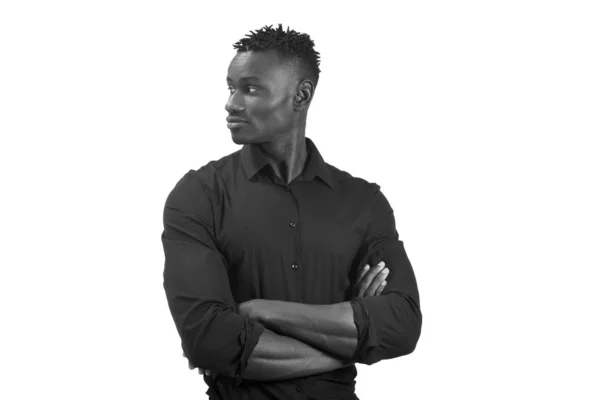 Portrait of an african man with arms crossed and looking to the — Stock Photo, Image