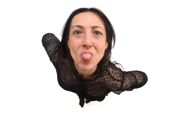 Woman sticking out her tongue on white — Stock Photo, Image